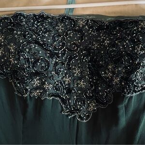 Jovani Green Maxi Dress some beads are missing on the bottom but easy to fix.